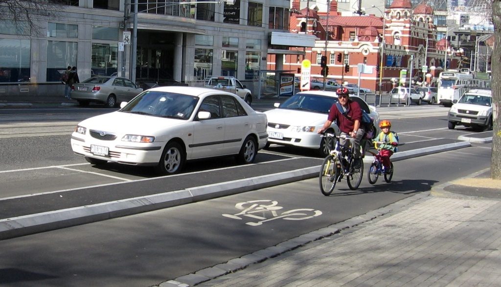 Swanston St, Melbourne - even Junior can ride along this one safely